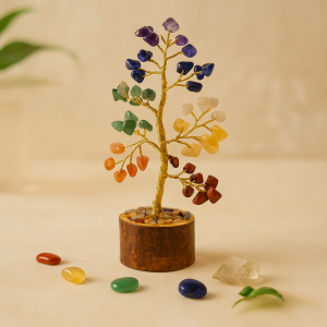 7 chakra gemstone tree with natural crystal stones and gold wire base on beige background – handcrafted by Vedoorja Jaipur